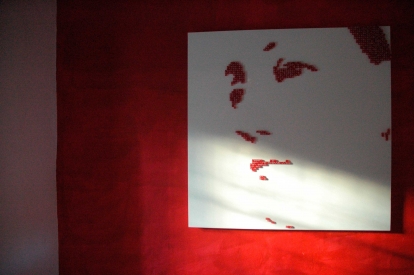 VIRGIN DE LAS VEGAS – 2006  - Red casino dice on white lacquered panel – 95” x 71” 