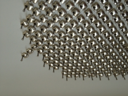 MAK SWIM DETAIL - 2013 metal hearts and stainless steel nails on white lacquered board - 40” x 40” - US$5300